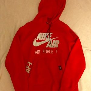Red Nike hoodie.